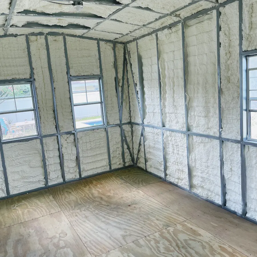 Closed-cell spray foam insulation applied to wall cavities in a residential project in Royse City